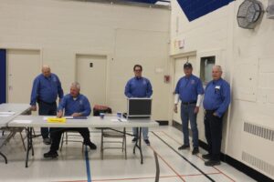 Volunteering this year from the Knights of Columbus were (left to right) Mike Maisonneuve, Phil Crane, Mark Mooney, Lionel Canard, Gary Bergeron. Absent from the picture are Bishop Msgr. Robert Bourgon and Jeff Young