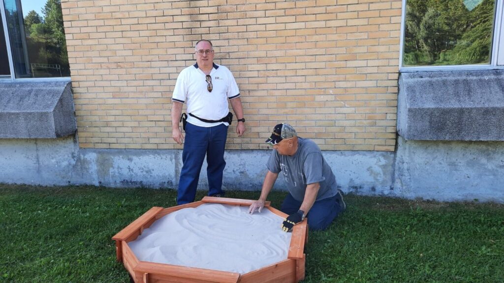 2025-09-17 - Knights of Columbus Installing Sandboxes (3) at Levack Public School. Knights Mike Maisonneuve and Jeff Young