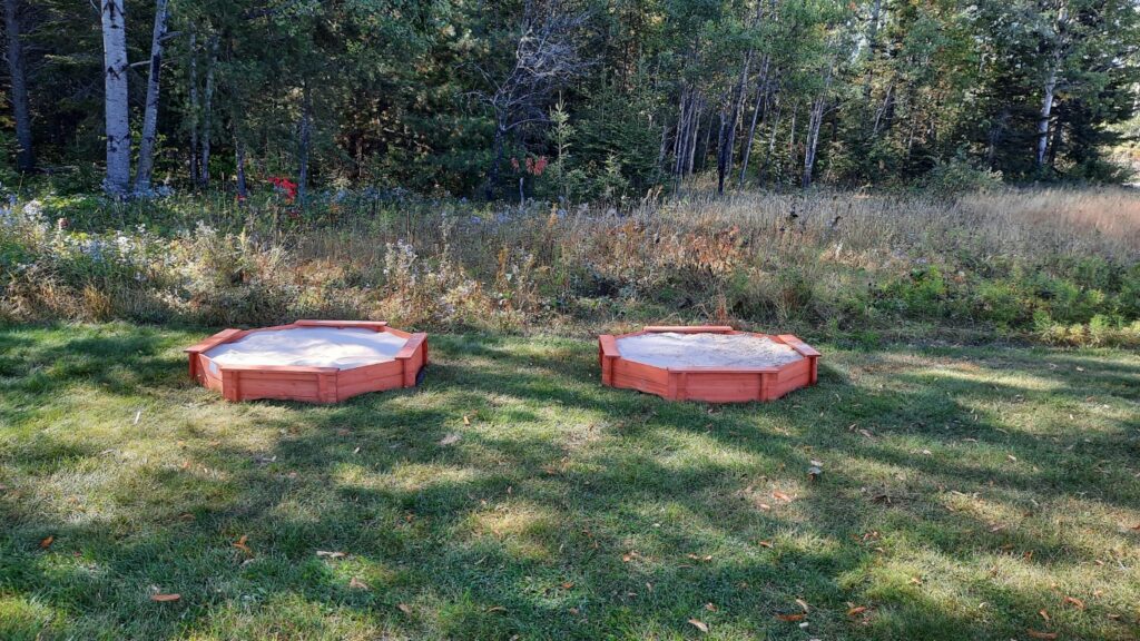 2025-09-17 - Knights of Columbus Installing Sandboxes (3) at Levack Public School. Completed sandboxes - ready for action